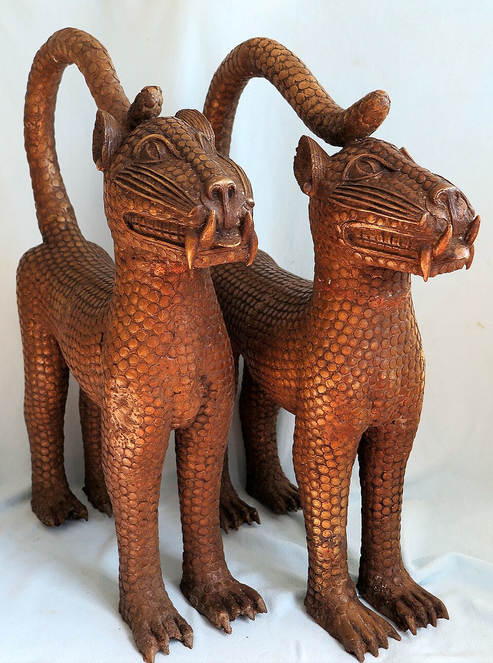 Pair of sculpted leopard figures from the Kingdom of Benin