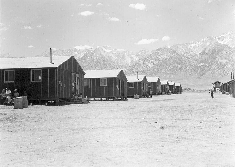 Barracks at the Manzanar War Relocation Authority center in a desert landscape