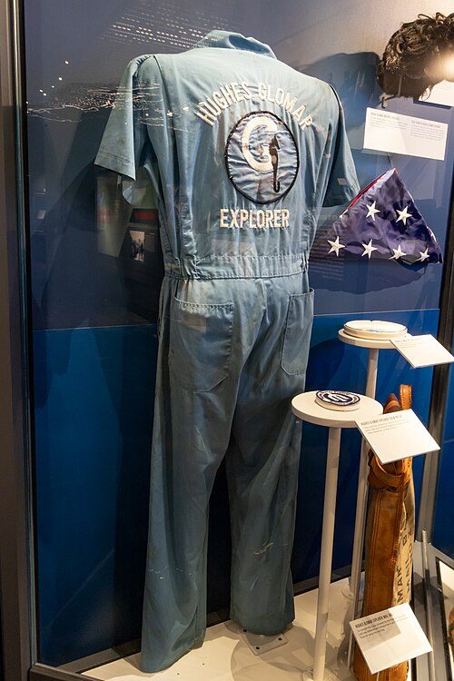 CIA Museum photograph of coveralls and an ashtray used as cover artifacts for the Hughes Glomar Explorer expedition.
