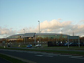 The Doughnut, GCHQ’s headquarters in Cheltenham; agency context, not a photograph of ECHELON equipment or collection.