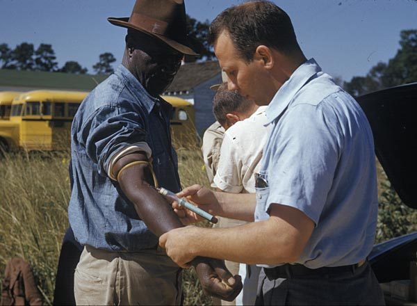 A participant undergoes a venipuncture during the Tuskegee study, as described by the CDC.