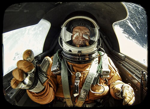 Pilot Christopher Michel inside the cockpit of a U-2 Dragon Lady at altitude